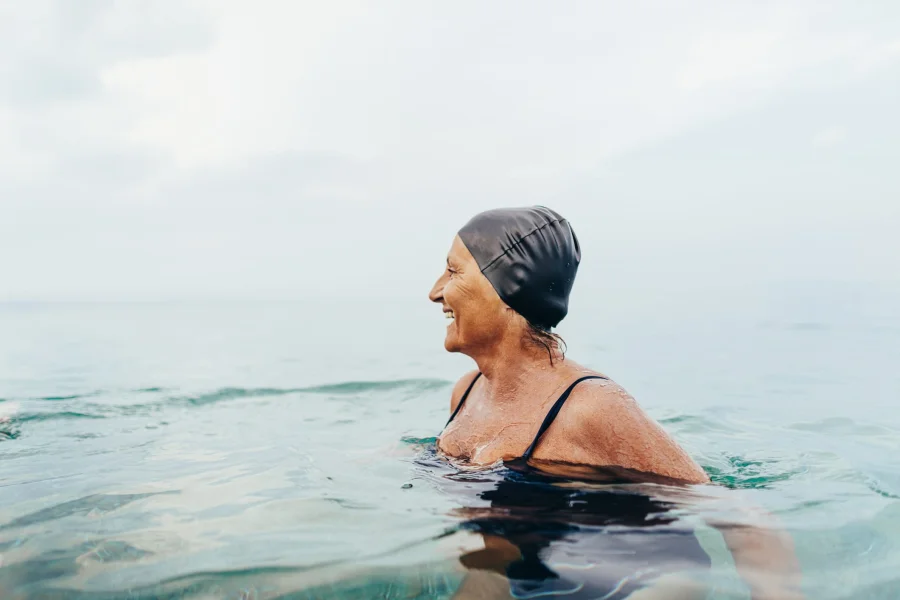A senior female swimmer in the sea